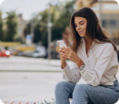 young-woman-talking-phone-outside-street (1) 1 young-woman-talking-phone-outside-street (1) 1